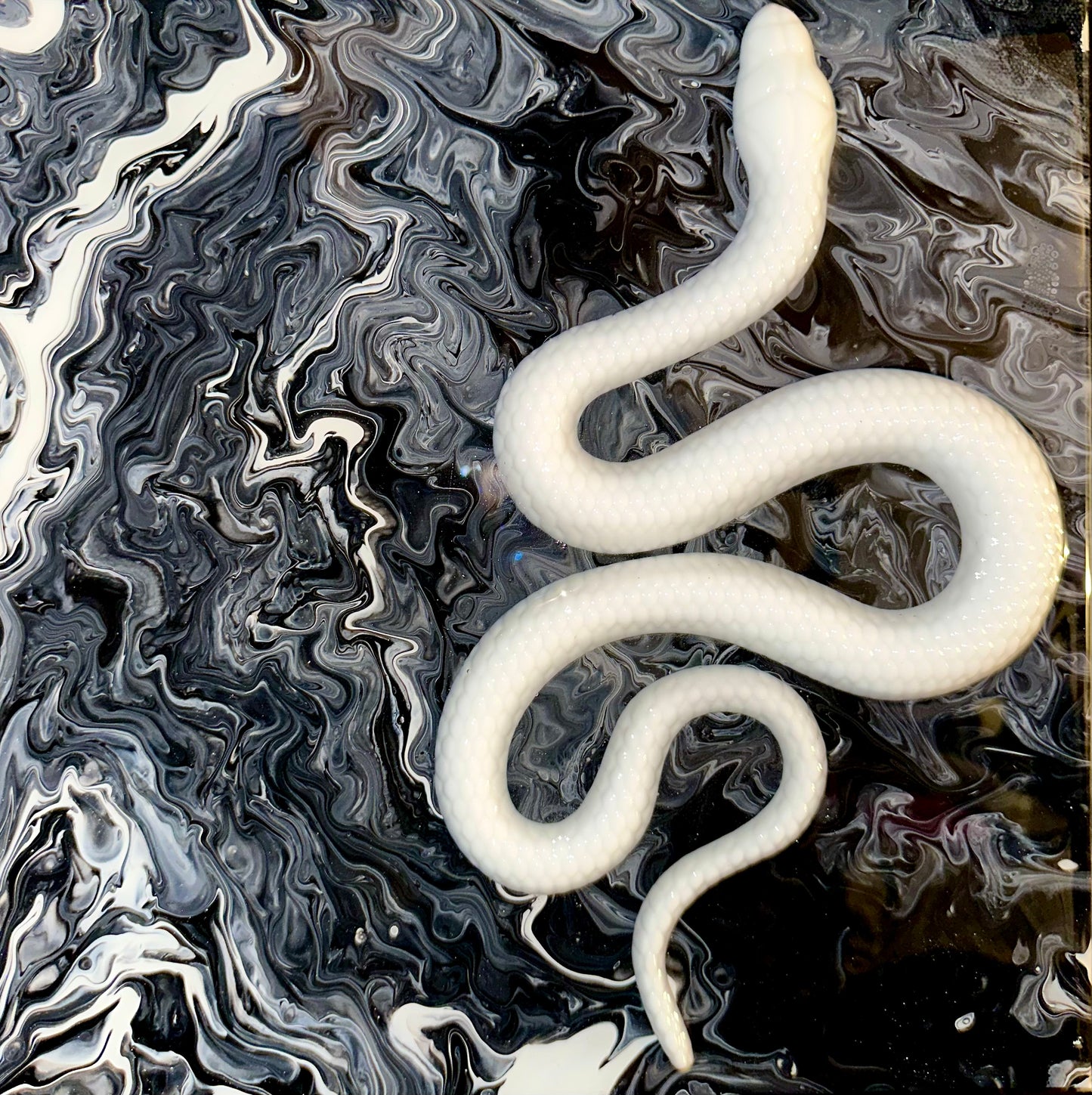3-D white albino snake